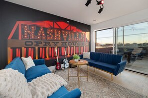 Gather with friends in the stylish whiskey lounge—complete with guitars and an amp for spontaneous jam sessions. - The Opry - Nashville, TN