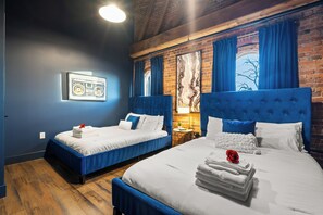Primary bedroom with 2 queen beds