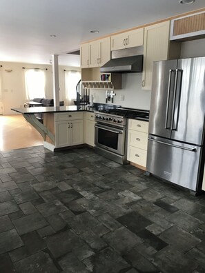Full kitchen with commercial 6 burner stove 