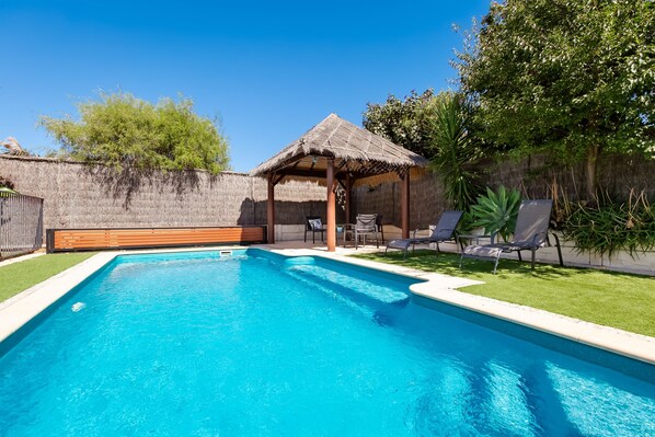 Relax and enjoy lounging around the salt water pool