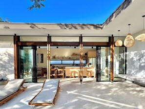 Once the main windows open, the inside and the outside become one.