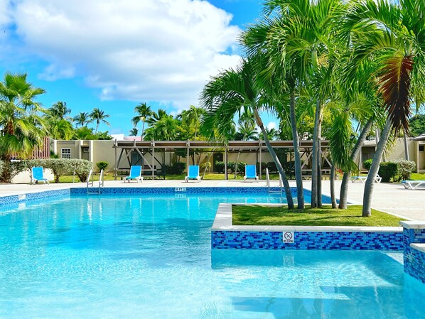 Take a refreshing dip, then unwind on a lounge chair with your favorite book.