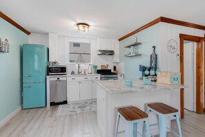 Full Kitchen – plenty of room for snacks & staples – dishwasher too!