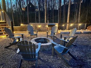 Outdoor with fire pit and park grill.