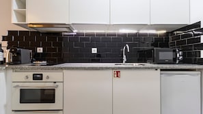 Our kitchenette is fully equipped with high-end appliances #modern #home