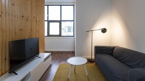 Whether you're sipping coffee by the window or lounging on the sofa, relaxation is guaranteed in our comfortable living area #TV #airbnb