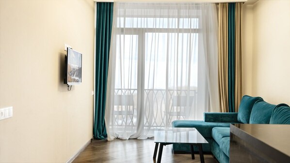 A sunny, comfy spot with soft curtains and a cozy couch – perfect for lazy mornings or chilled evenings✨