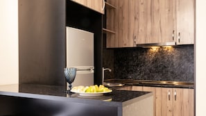 A warm, stylish nook with everything you need to whip up a quick meal or linger over a cup of tea ☕️🍳