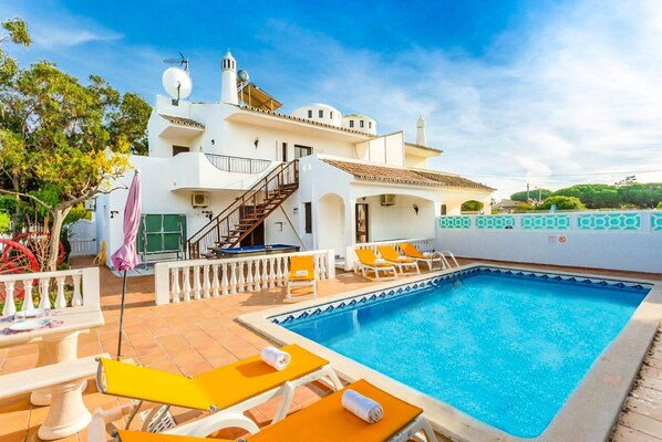 Tasteful morning tones of property and pool