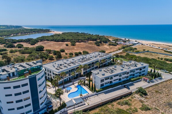 Arial view of apartment complex and beach