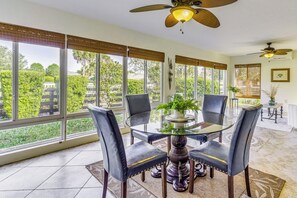 Enclosed Sunroom | Lounge Seating | Dining Table