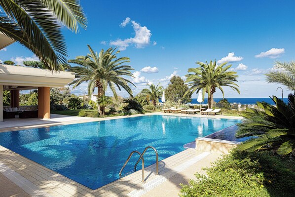 Dive into bliss in a 130m² private pool.