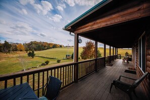  Ample outdoor seating, great for gatherings or enjoying panoramic countryside vistas.