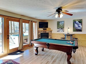 Game Room featuring a Full-Size Pool Table, Arcade Games, Card Table, Mini Fridge + Deck Access