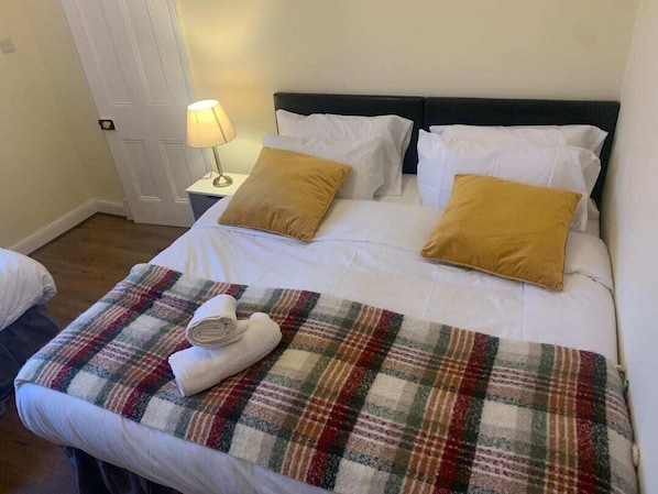 Spacious east facing bedroom with super king bed upstairs