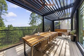Main level patio. Pergola open / Screen down