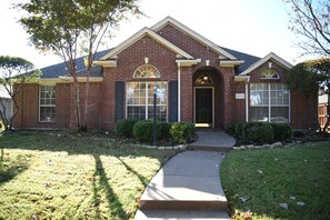 This charming brick home invites you in with its warm, classic exterior, lush greenery, and peaceful vibe. A cozy getaway ideal for relaxing, making memories, or exploring the local area. Book your stay today and feel right at home!