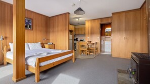 Bed area, living, dining and kitchen