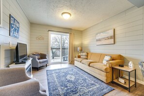 Living Room | Sleeper Sofa | Smart TV | Electric Fireplace | Balcony Access