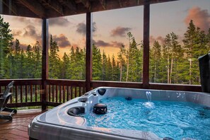 Soak in mountain views from the private hot tub on our spacious deck