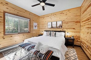 Drift off in a dreamy king bed wrapped in soft hotel-quality luxury linens