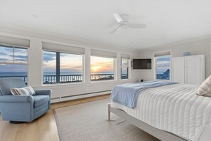 Welcome to the second-floor master bedroom, your serene escape with a plush king bed and a private ensuite bathroom.