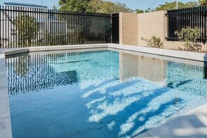 Dive into paradise! Enjoy a refreshing swim or lounge poolside under the sun.