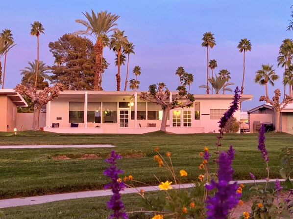 View of the house from the swimming pool in the center of the grounds.