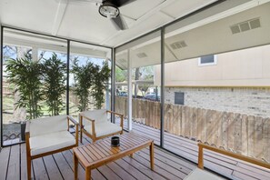 Relax on the covered, screened patio