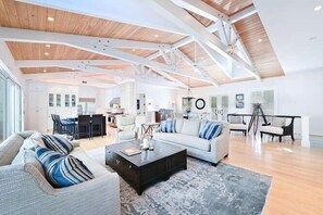 An open floor design with vaulted ceilings that inspires relaxation and connection. 