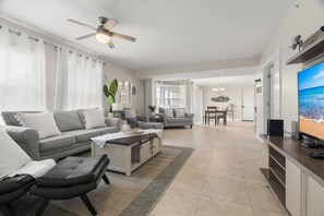 Living Room with Smart TV and Plenty of Space for the Whole Family to Gather!