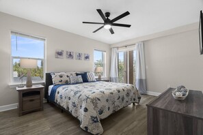 Primary Master Bedroom with King Size Bed and Private Balcony