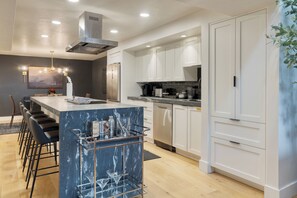 Sleek, fully equipped kitchen.