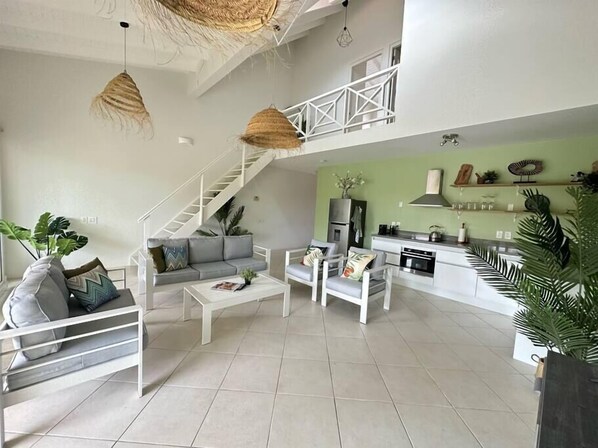Living room with open kitchen (main floor)