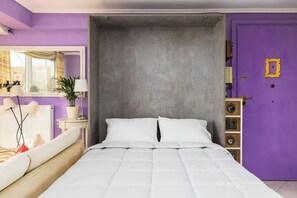 Sleep like a star in this cozy queen-size bed, with a 'Friends' door for charm!