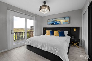 Luxury king bed. Upper level bedroom with a beautiful view.