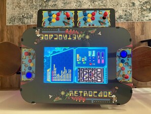 Game on! Play solo or challenge a friend with the Retrocade 1162—packed with 1,162 classic games! Battle side by side or go head-to-head for ultimate bragging rights. 