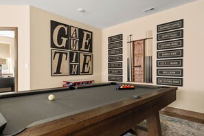Bring on the friendly competition! Our game room features a classic arcade machine and a 7' pool table, perfect for epic tournaments and family fun. Whether you're sinking shots or chasing high scores, this space is your go-to for laughs, connection, and good times. 