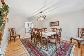 Dining Room view upon entry. Table seats up to 8 comfortably.