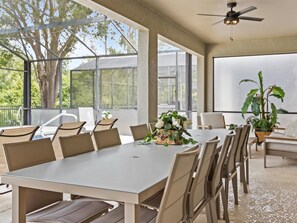 This table for 12 is perfect for enjoying the Florida weather, rain or shine. 