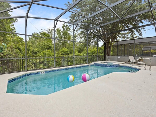 The nature preserve behind the house makes the patio a relaxing oasis. 