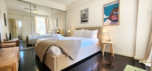 Queen sized bedroom. Built-in wardrobes, ceiling fan & TV. Bathroom off bedroom