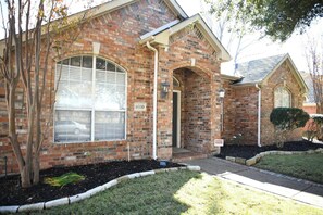 Welcome to your peaceful getaway. This charming brick home invites you to relax in comfort and style.