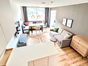 Furniture, Interior Design, Flooring, Floor, Wood, Couch, Room, Lighting, Living Room, Table