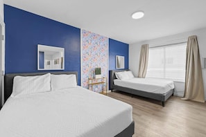 Beachy dreams on our queen-sized beds