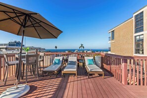Gaze towards to the coastline on the rooftop deck