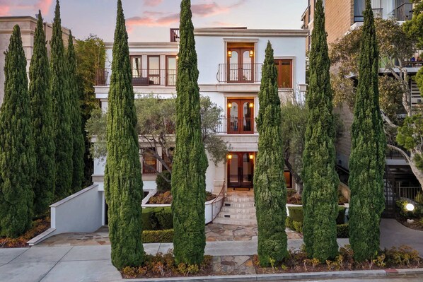 Welcome to this grand estate in a prime location with rooftop deck - majestic exterior front