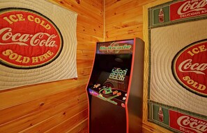 Step into nostalgia with this cozy corner, and have some fun with arcade! 
