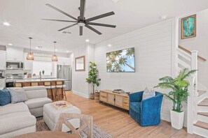 Experience seamless living with our open floor plan, where the kitchen, dining, and living spaces flow effortlessly together.