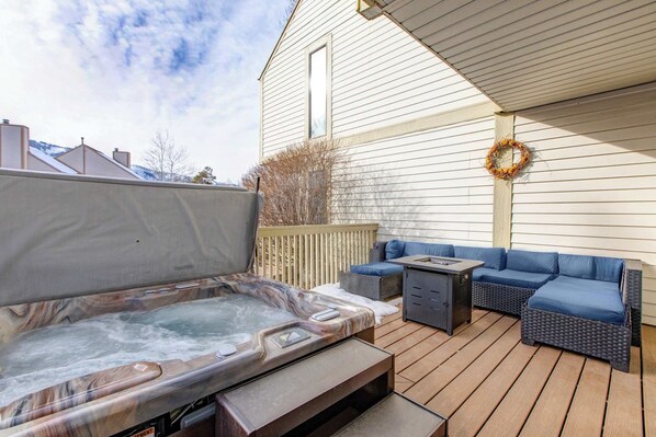 Outdoor area. Hot Tub, Grill, Fire pit and a great outdoor seating area!